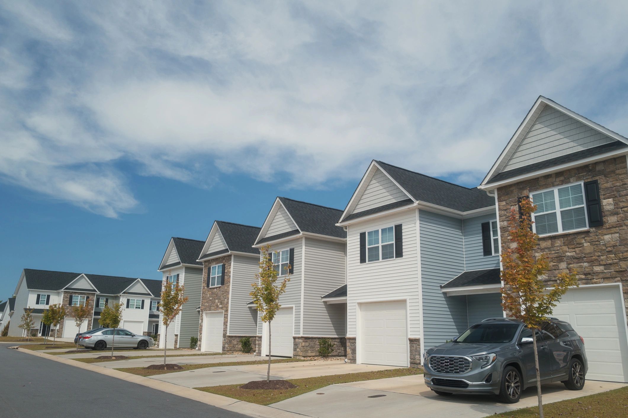Townhome community exterior under a clear sky